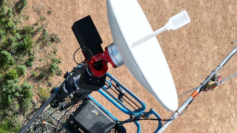 WorldLinX GTS ground tracking unit with its dish, seen from above on a lift platform